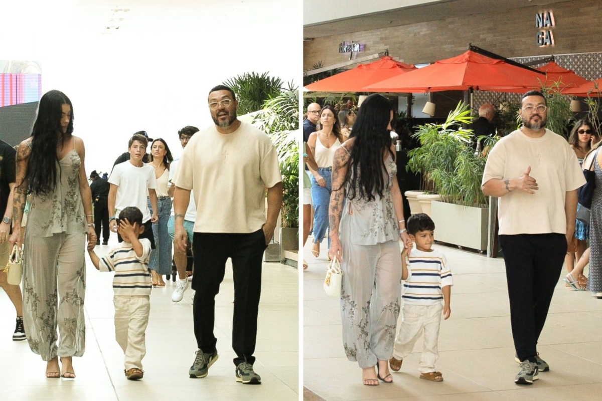 Rayane, o filho, e Belo passeiam no shopping
