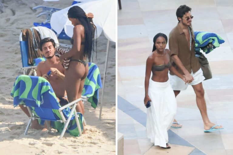 Duda Santos e Tiago Iorc na praia
